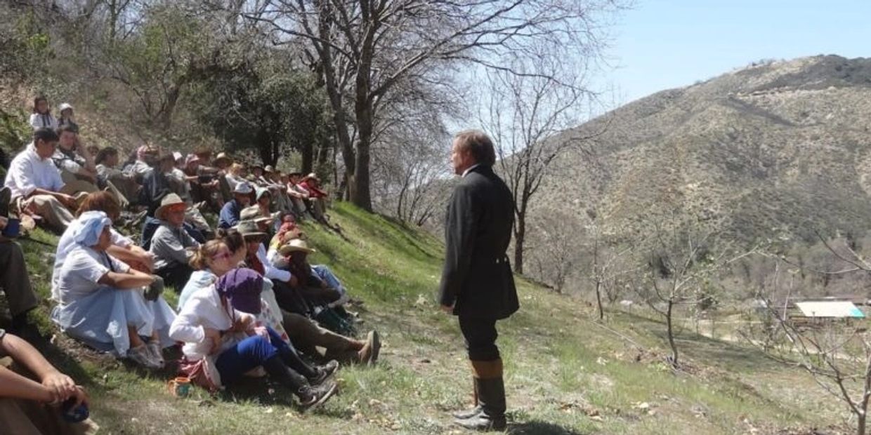 Brigham Young giving a speech that everyone made it to the promised land.