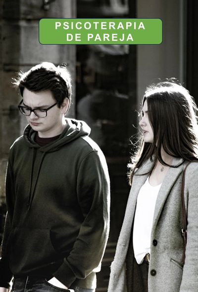 Couple walking apart, highlighting relationship therapy needs.