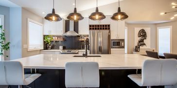 Calgary kitchen design featuring ikea cabinets and custom walnut woodwork