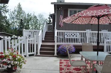 Outdoor seating arrangement and flower plants