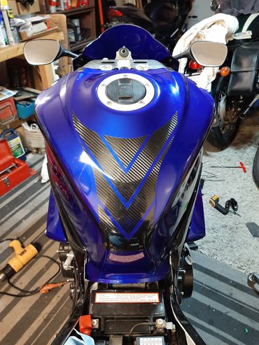 Custom designed carbon fibre vinyl tank pad