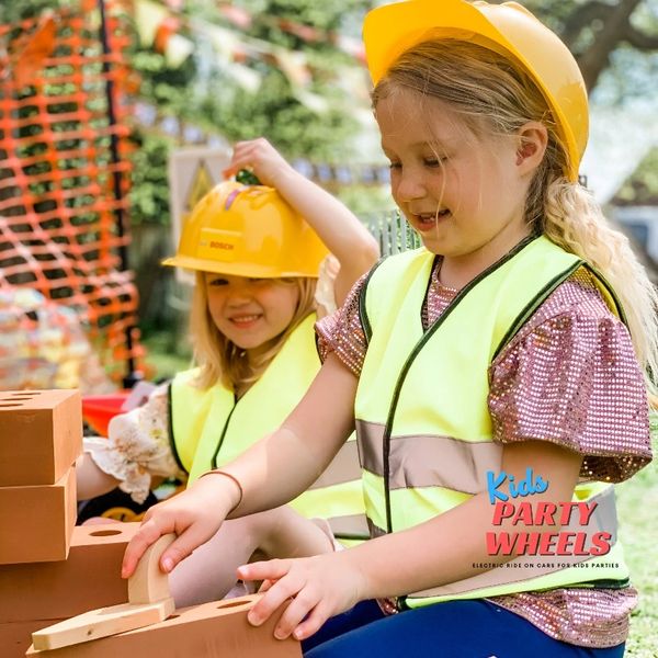 kids playing with bricks at a kids party wheels construction party. 