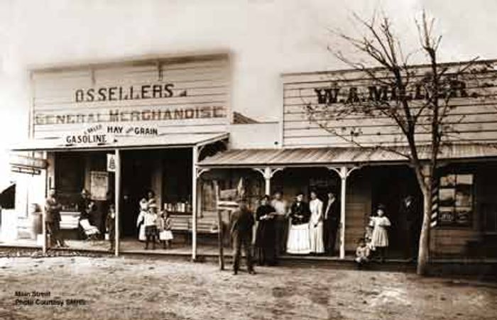 O.S Sellers General Merchandise Store and W.A Miller Restaurant and Barbershop about 1908