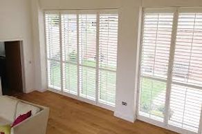 white shutter Patio door