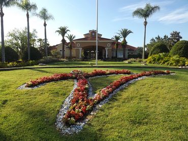Terra Verde Resort clubhouse, landscape and palm trees