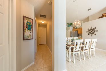 Disney Lillian House hallway leading to private bedrooms off of kitchen and living room area