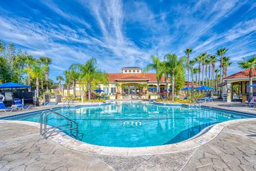 Terra Verde Resort pool, palm trees, tiki bar