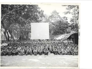 August 1943 VT-21 entire squadron photo at their Lunga Beach, Guadalcanal campsite at tours end.