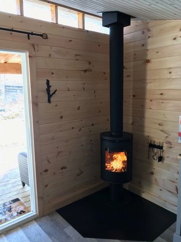 modern wood stove
Morso
compact wood stove
hearth pad
wett certified
surrounding Kawartha Lakes