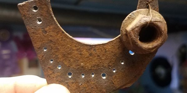 Drilled metal for one of our found metal artworks.