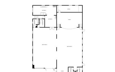 Commercial floor plan layout for a rental building, showcasing two halls and four bathrooms.