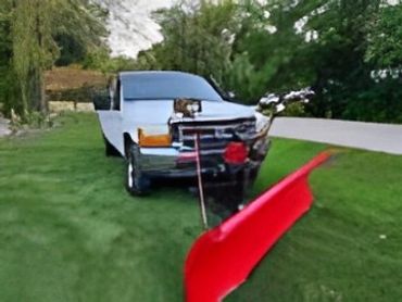Ford F250 with red plow