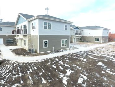 Rear Left view of Snow cleared sidewalks
