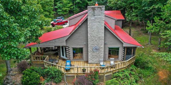 Wrap around porch for relaxing with panoramic views of the Boston Mountains and abundant wildlife.