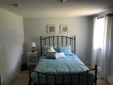 SAND bedroom restful room with queen bed