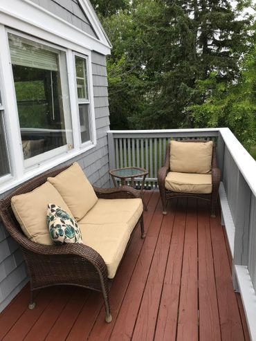 Front deck…watchtower world go by…morning coffee or afternoon drinks…either works just fine!