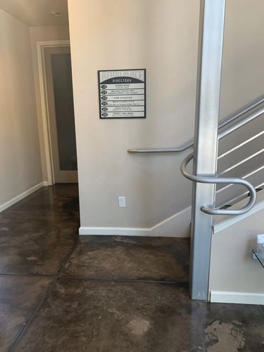 Stairs leading up from ground level to Pure Hydration Chico.