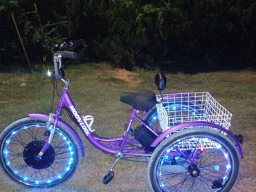 SOLD AS IS. SLIGHTLY USED Rose Purple 26 inch Electric Tricycle with front and rear brakes. 1000 wat