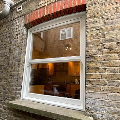 uPVC Rehau Heritage sash window in Charlton