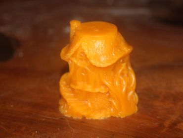 Close-up of an orange 3D printed object.