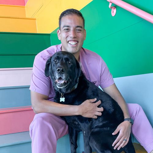 Photo of Dr. Marcus, The Friendly Vet, with his dog Charlie