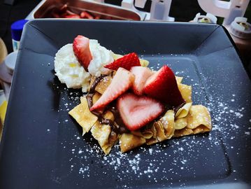 Crepe pasta filled with the toppings and drizzles of your choice.
