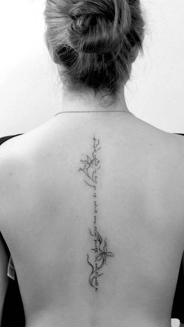 Fine line back tattoo script