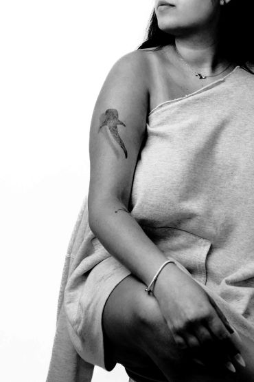 Fine line whale shark tattoo
