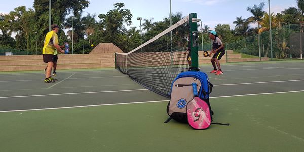 People playing pickleball