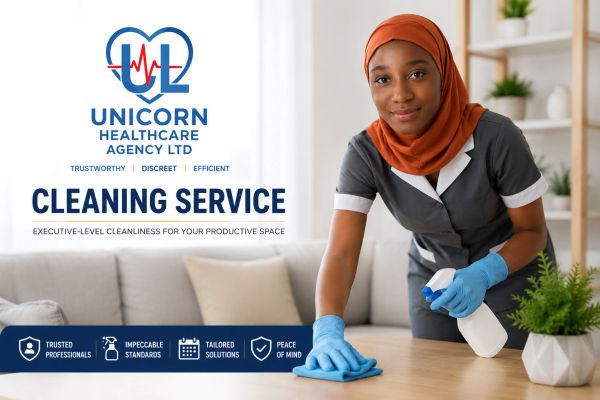 Professional cleaner in uniform cleaning a table for Unicorn Healthcare Agency LTD.