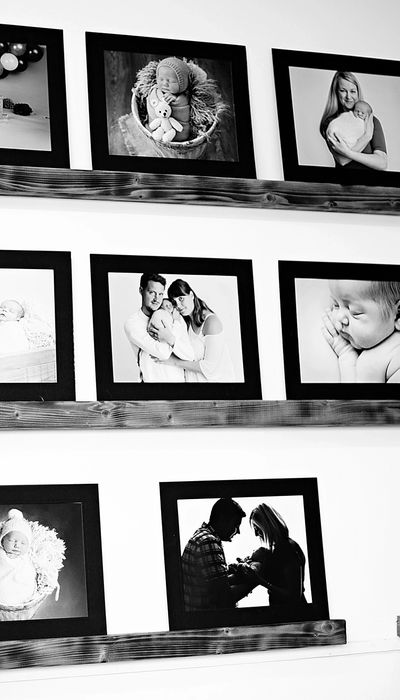 Display of mounted prints on a shelf ready for a viewing appointment at Lavender and Lace.