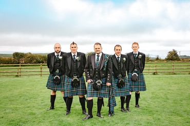 Grooms men wearing Cornish Tartan