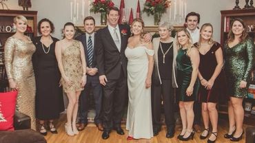 Wedding party wearing leaf pins.