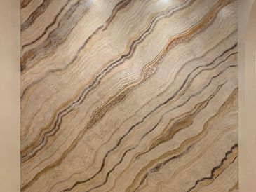 Marble wall with natural wavy patterns.