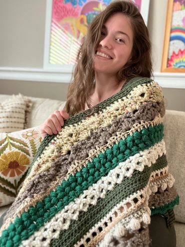 Intricate hand crocheted shawl.