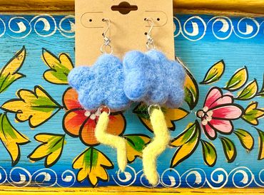 Handmade needle felted storm cloud earrings.
