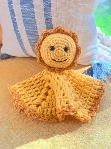 Crochet baby lovey toy.