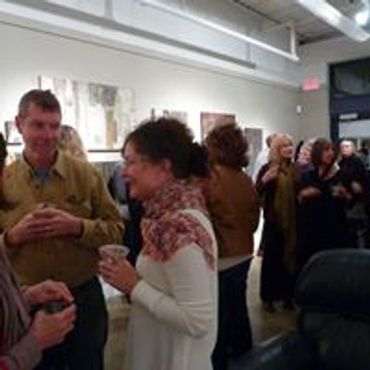The crowd at an art opening at Ledbetter Gallery.