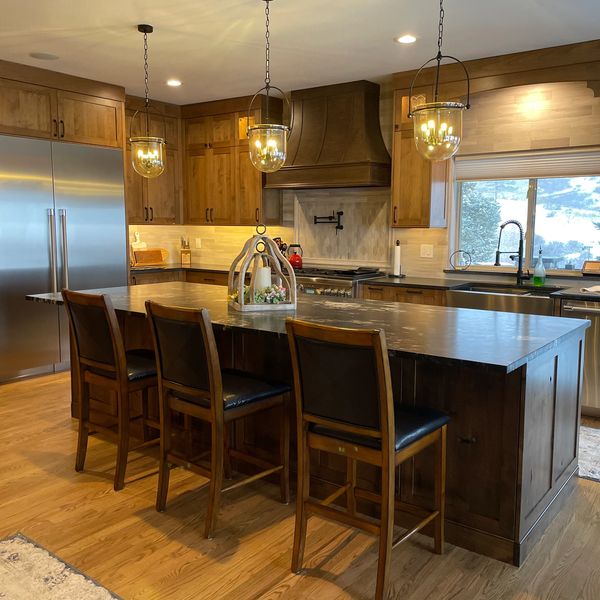 Beautiful Alder kitchen cabinets with large island in Roxborough Park