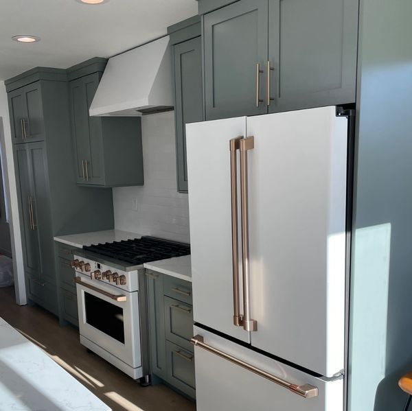 Green shaker kitchen cabinets in Lakewood