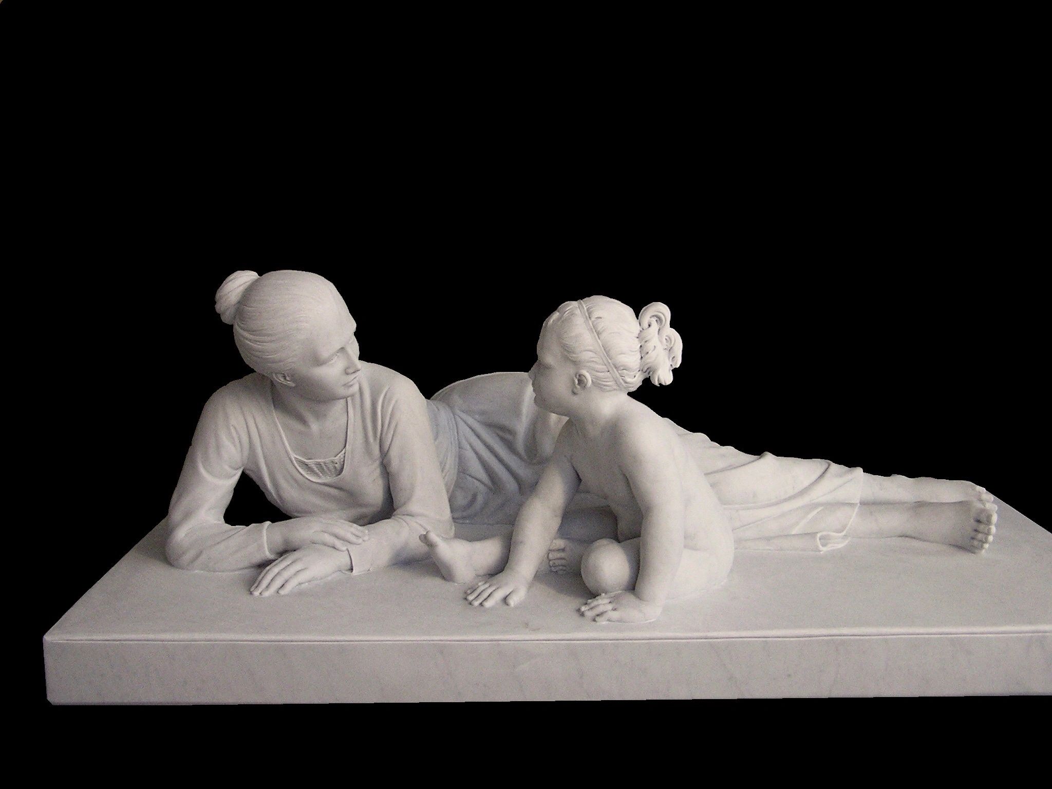 Marble sculpture of a woman and a child created by Marcello Giorgi sculptor.