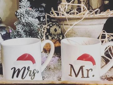 Mr and Mrs Santa Coffee Cups, white with santa hats on mugs.