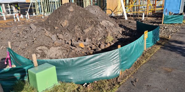 Residential building site silt fence.