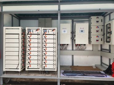 Battery and inverter system setup in an industrial enclosure at MG EV Showroom.
