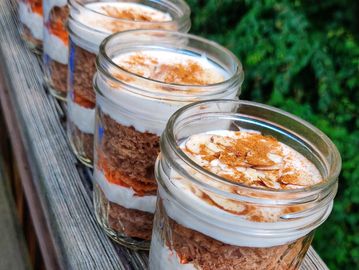 Cakes in a jar with cinnamon toppings