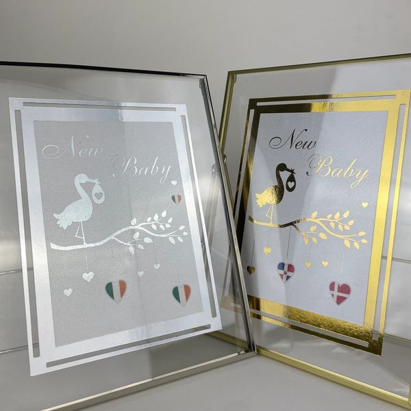 Close picture of two photoframes