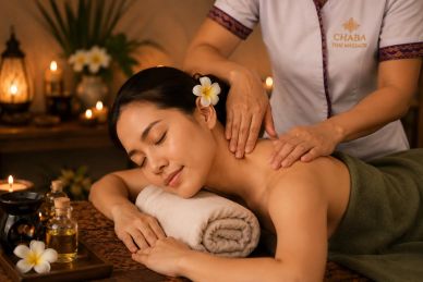 Woman receiving a relaxing shoulder massage at a spa.