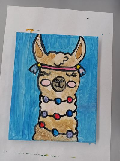 Cute llama drawing with colorful decorations against a blue background.