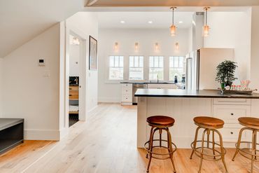 Penthouse mountain views in all directions. Boutique Kalispell lodging. With full kitchen