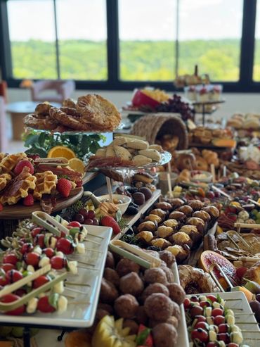 Elegant charcuterie board with a mix of cheeses, cured meats, and fresh ingredients.